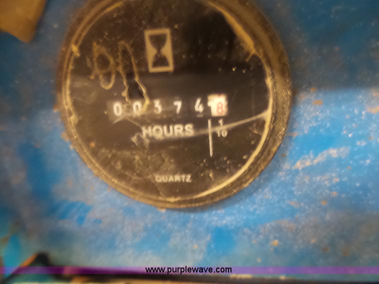 image for item L6064 2005 Genie GR15 scissor lift