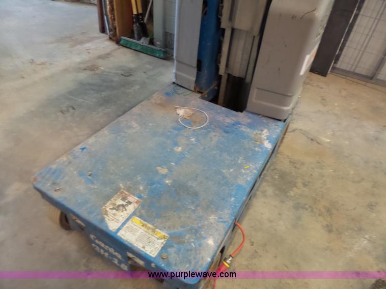 image for item L6064 2005 Genie GR15 scissor lift