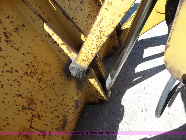 image for item L6082 1996 John Deere 310D backhoe