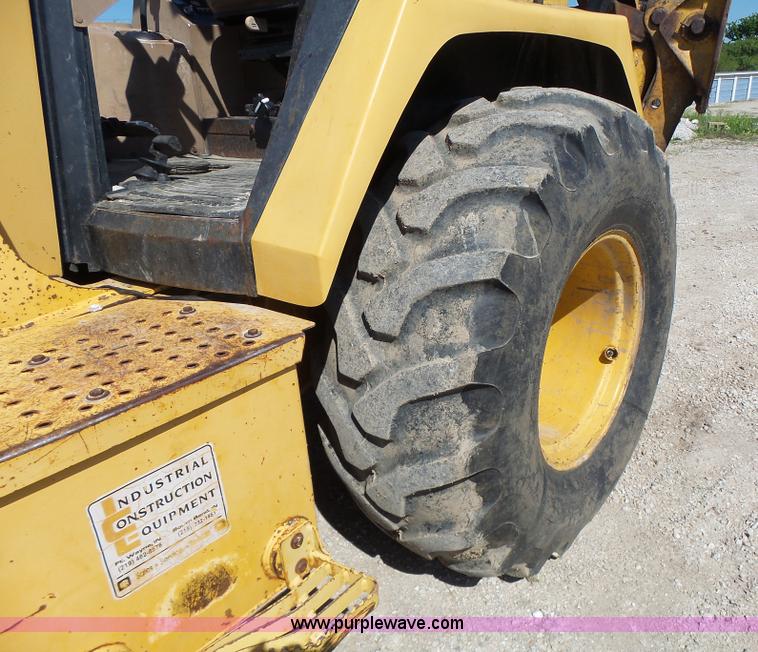 image for item L6082 1996 John Deere 310D backhoe