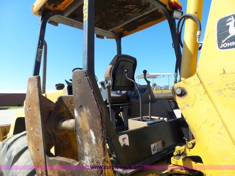 image for item L6082 1996 John Deere 310D backhoe