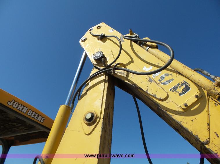 image for item L6082 1996 John Deere 310D backhoe