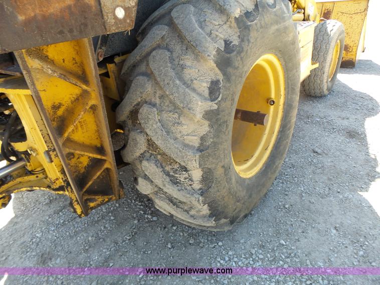 image for item L6082 1996 John Deere 310D backhoe