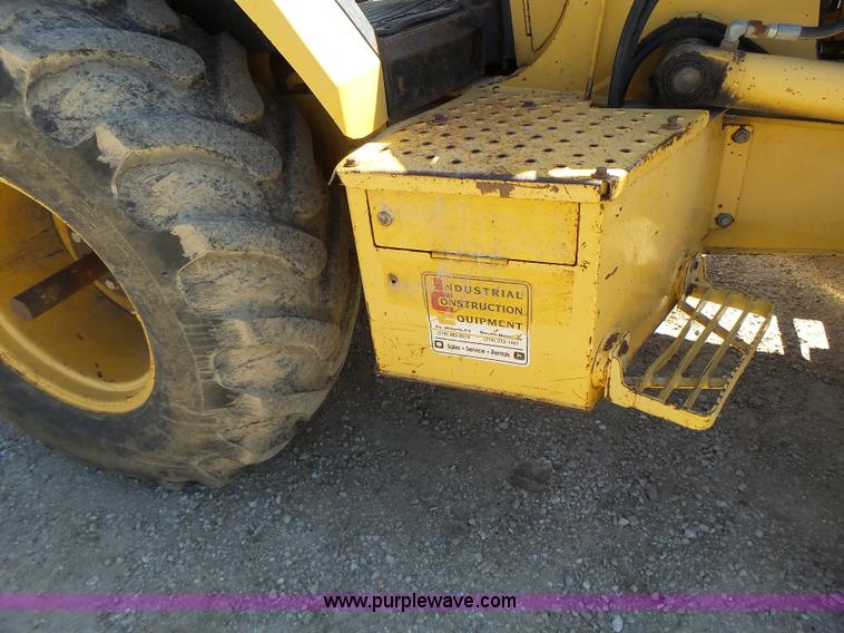 image for item L6082 1996 John Deere 310D backhoe