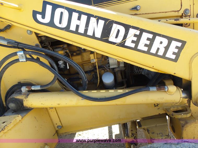 image for item L6082 1996 John Deere 310D backhoe