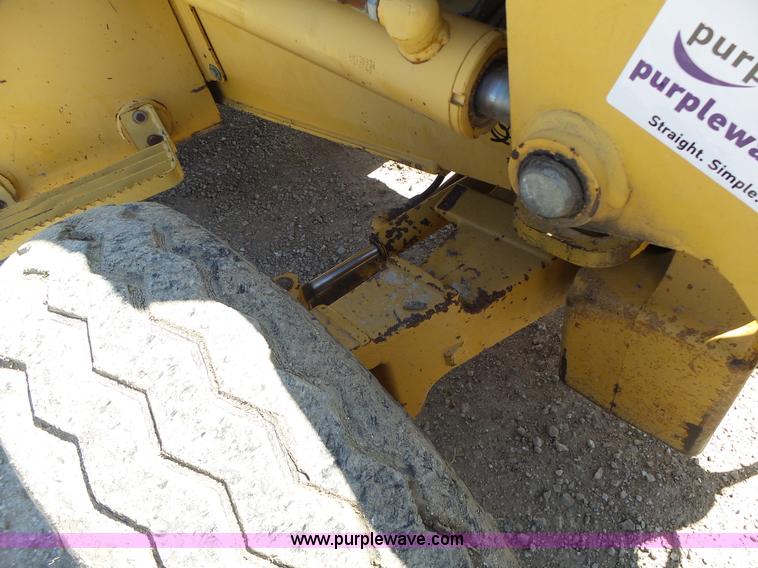 image for item L6082 1996 John Deere 310D backhoe