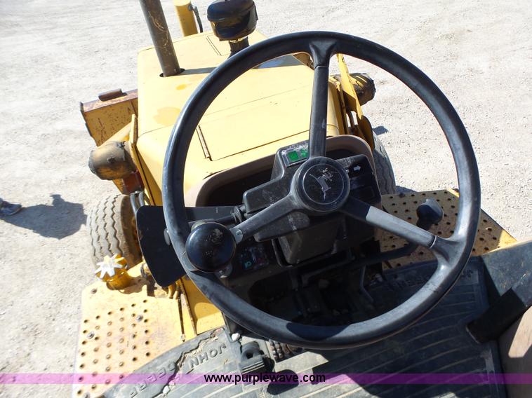 image for item L6082 1996 John Deere 310D backhoe