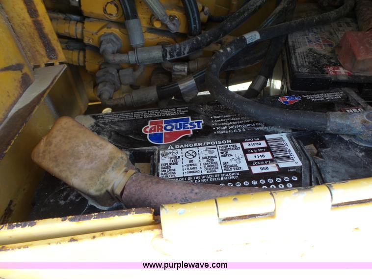 image for item L6082 1996 John Deere 310D backhoe