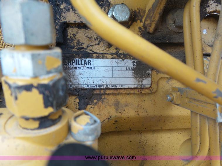 image for item L6345 1998 Caterpillar CP-323C single drum vibratory roller