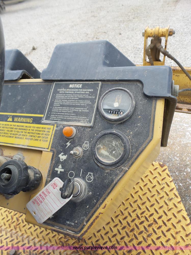 image for item L6345 1998 Caterpillar CP-323C single drum vibratory roller