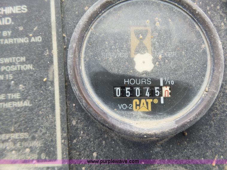 image for item L6345 1998 Caterpillar CP-323C single drum vibratory roller