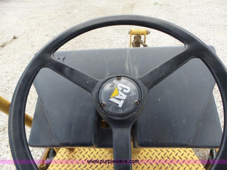 image for item L6345 1998 Caterpillar CP-323C single drum vibratory roller
