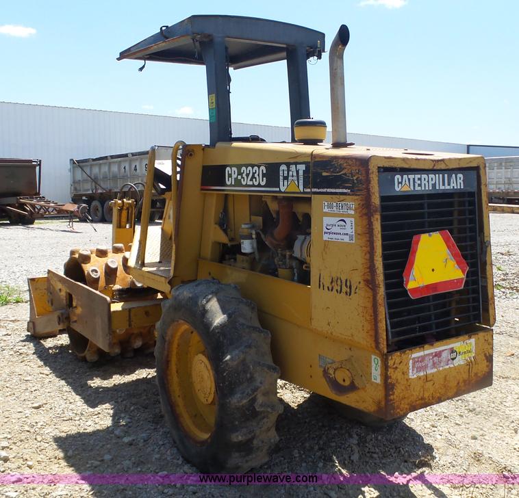 image for item L6347 2002 Caterpillar CP-323C vibratory padfoot roller