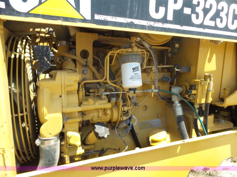 image for item L6347 2002 Caterpillar CP-323C vibratory padfoot roller