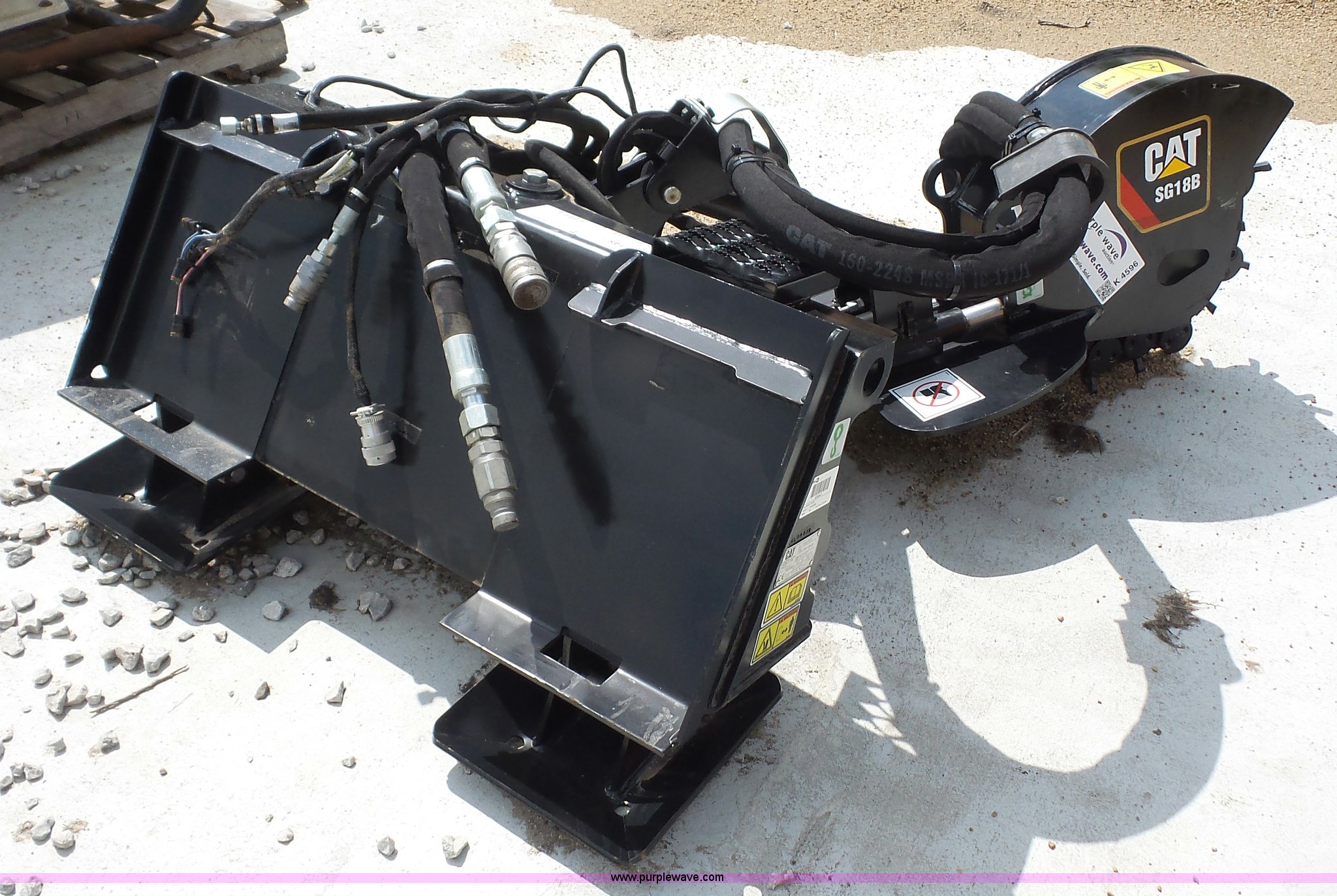 Caterpillar SG18B skid steer stump grinder in Olathe, KS Item K4596