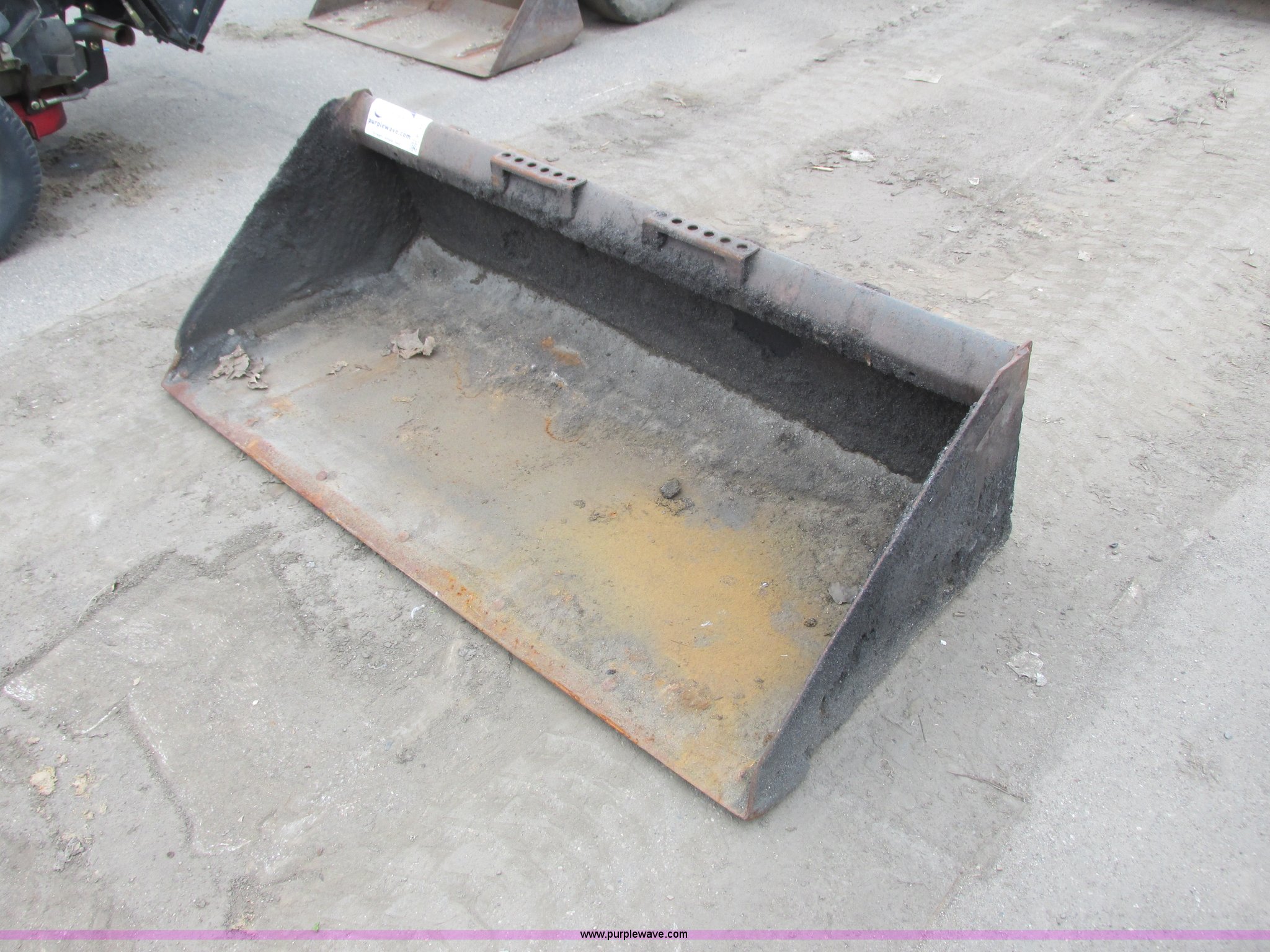 Skid steer bucket in Burnsville, MN Item K4703 sold Purple Wave