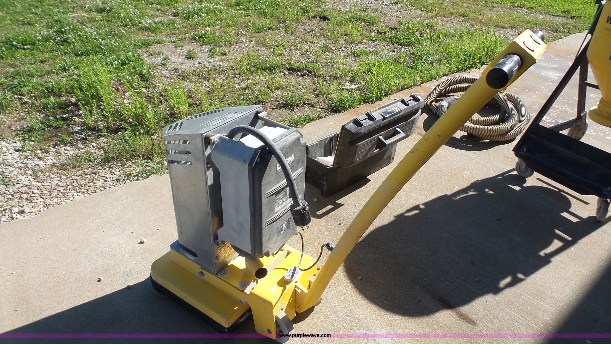 Werkmaster Titan XT concrete grinder with vacuum in Lawrence, KS Item