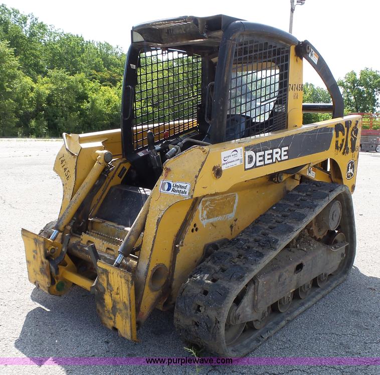 image for item J4102 John Deere 322T skid steer