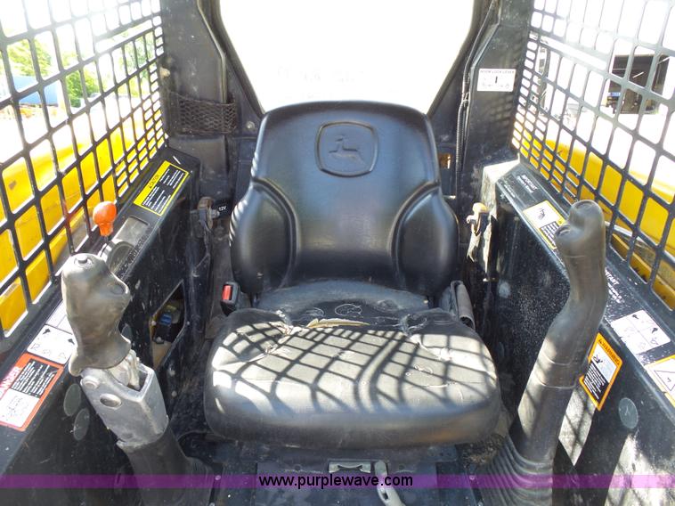 image for item J4102 John Deere 322T skid steer
