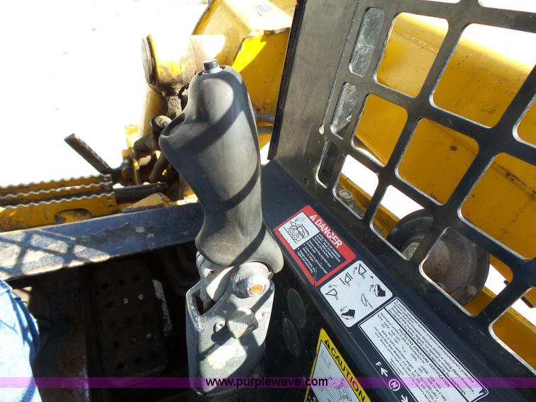 image for item J4102 John Deere 322T skid steer