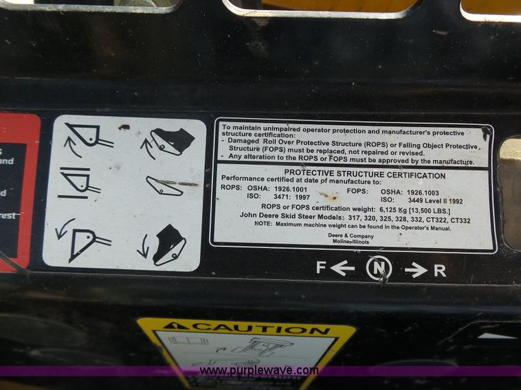 image for item J4102 John Deere 322T skid steer