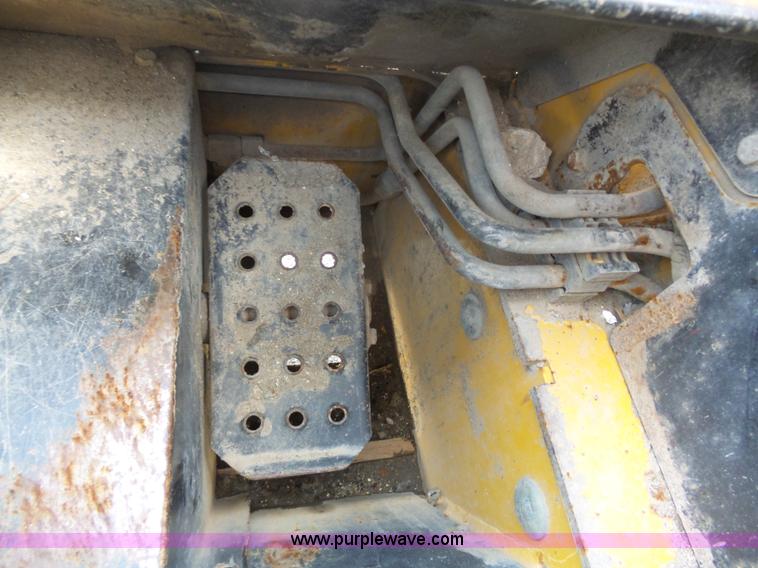 image for item J4102 John Deere 322T skid steer