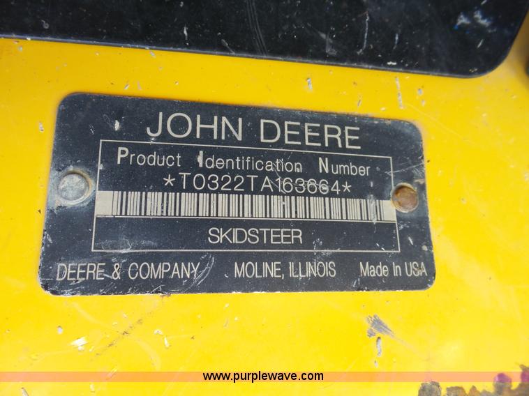 image for item J4102 John Deere 322T skid steer
