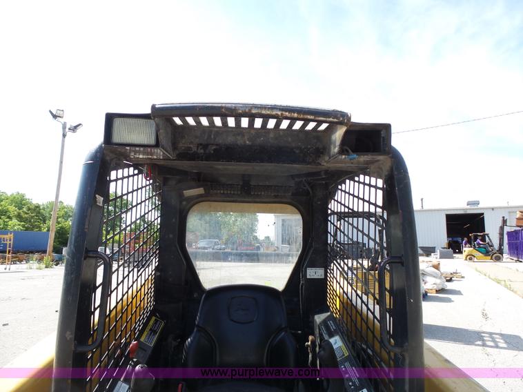 image for item J4102 John Deere 322T skid steer