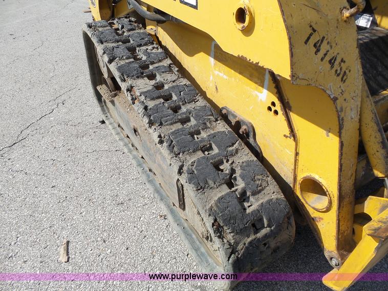 image for item J4102 John Deere 322T skid steer
