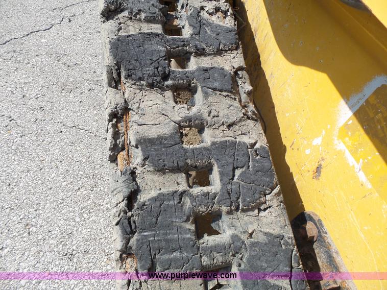 image for item J4102 John Deere 322T skid steer