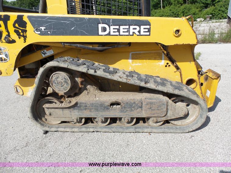 image for item J4102 John Deere 322T skid steer