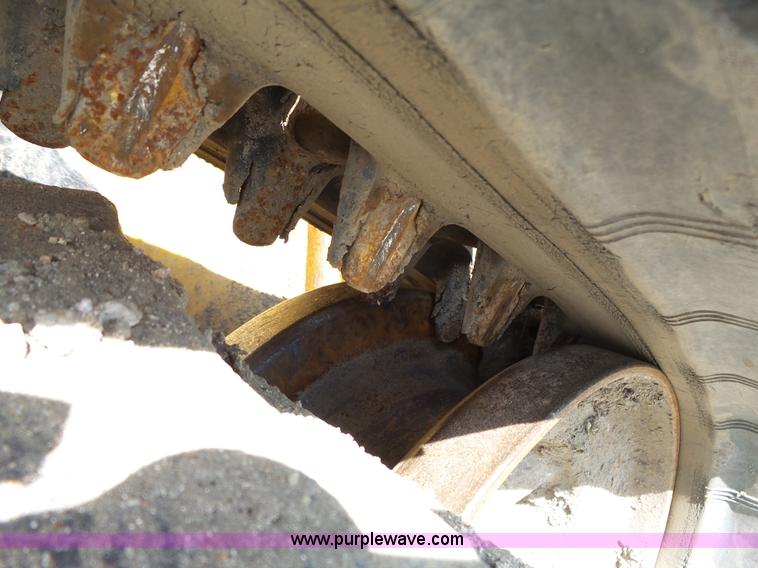 image for item J4102 John Deere 322T skid steer