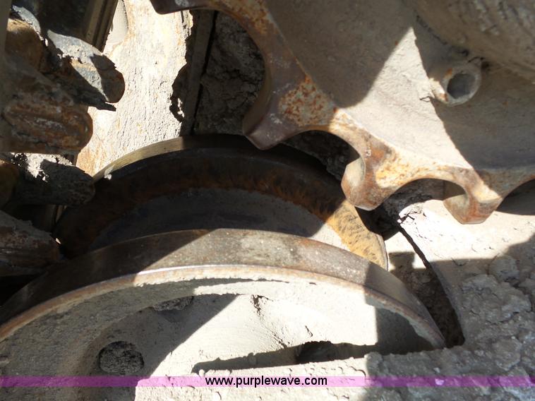 image for item J4102 John Deere 322T skid steer