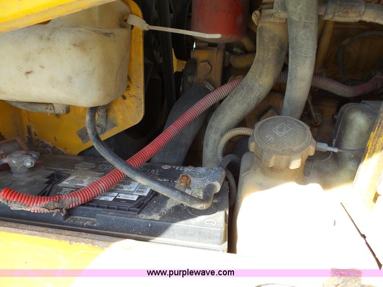 image for item J4102 John Deere 322T skid steer