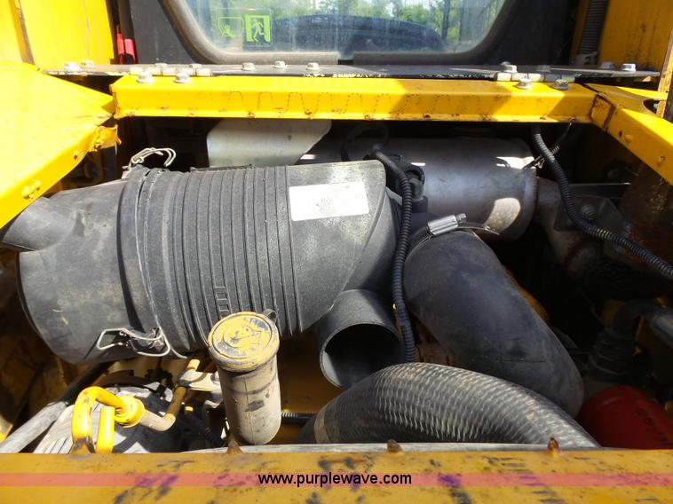 image for item J4102 John Deere 322T skid steer