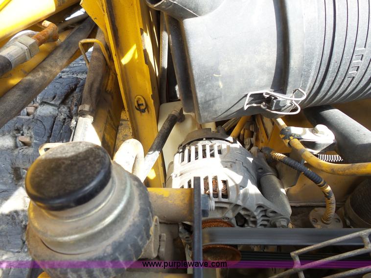 image for item J4102 John Deere 322T skid steer