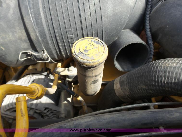 image for item J4102 John Deere 322T skid steer