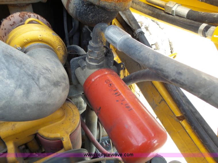 image for item J4102 John Deere 322T skid steer