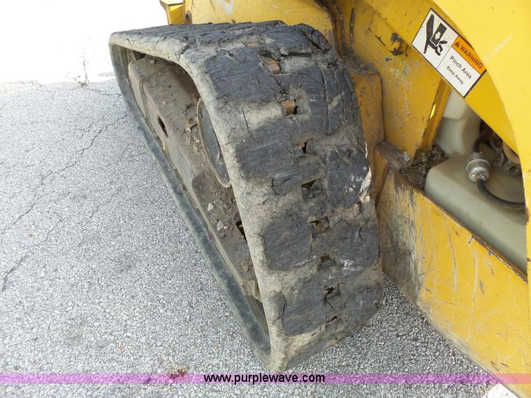 image for item J4102 John Deere 322T skid steer