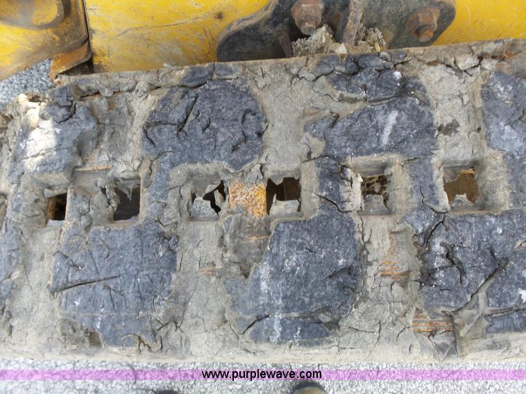 image for item J4102 John Deere 322T skid steer