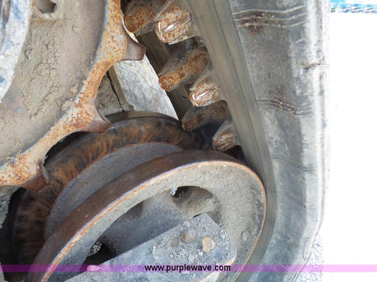 image for item J4102 John Deere 322T skid steer