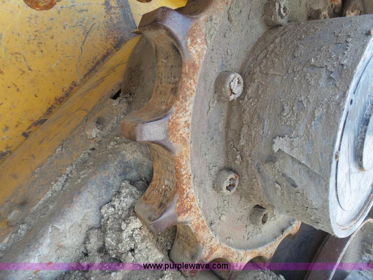 image for item J4102 John Deere 322T skid steer