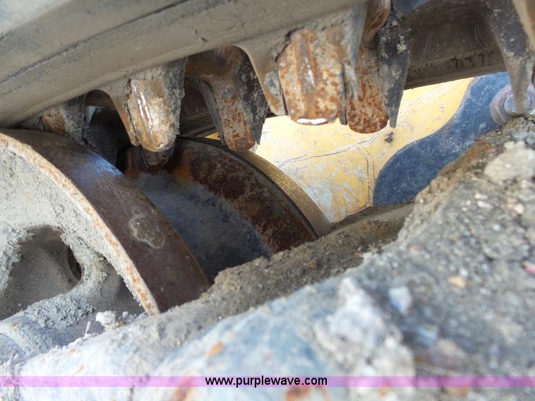 image for item J4102 John Deere 322T skid steer