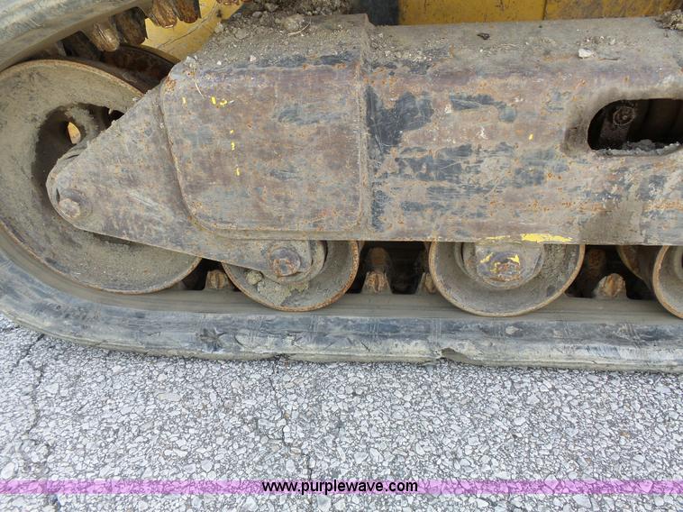 image for item J4102 John Deere 322T skid steer