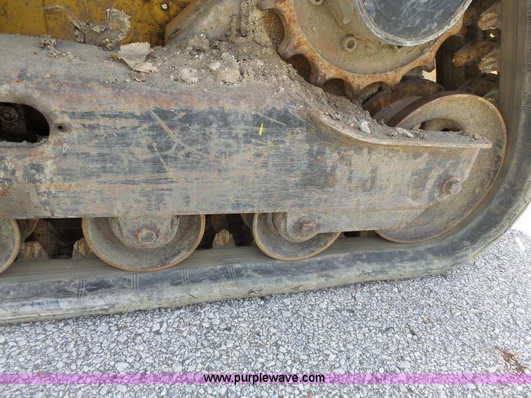 image for item J4102 John Deere 322T skid steer