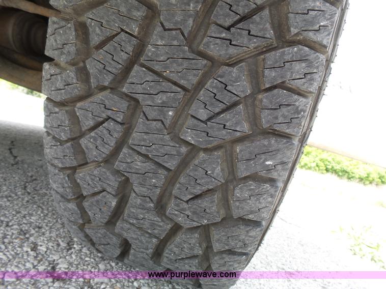 image for item J4952 2005 Nissan Titan Crew Cab pickup truck