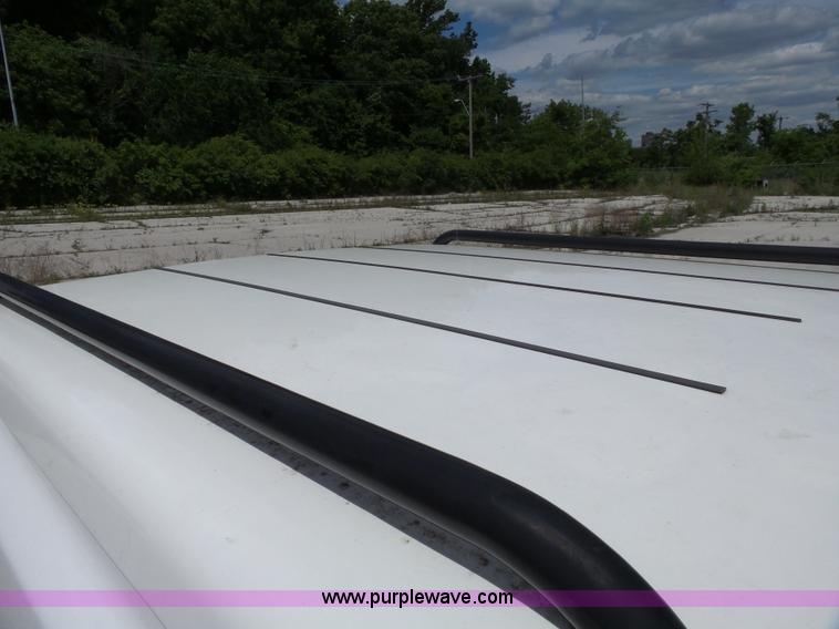 image for item J4952 2005 Nissan Titan Crew Cab pickup truck