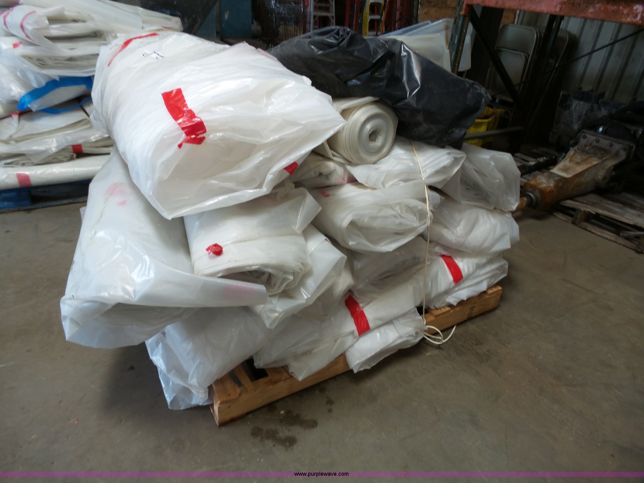 Rolls of plastic in Kansas City, MO Item BZ9479 sold Purple Wave