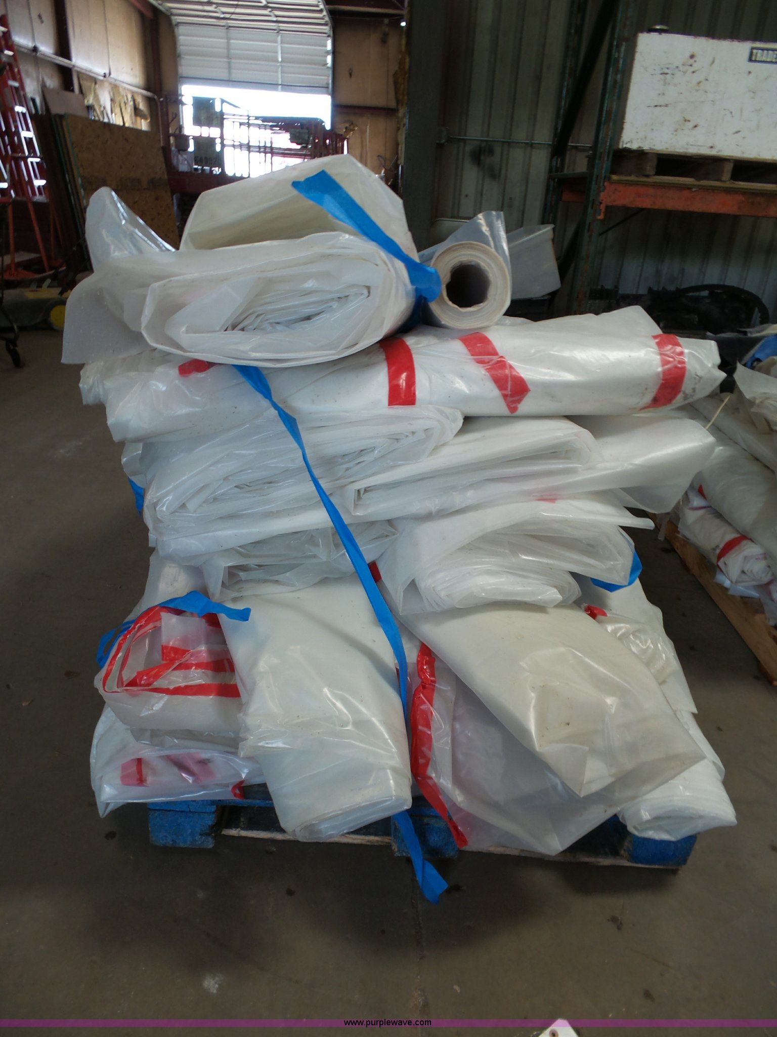 Rolls of plastic in Kansas City, MO Item BZ9479 sold Purple Wave