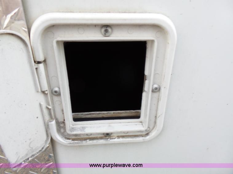 image for item J4112 2011 Sharp enclosed cargo trailer